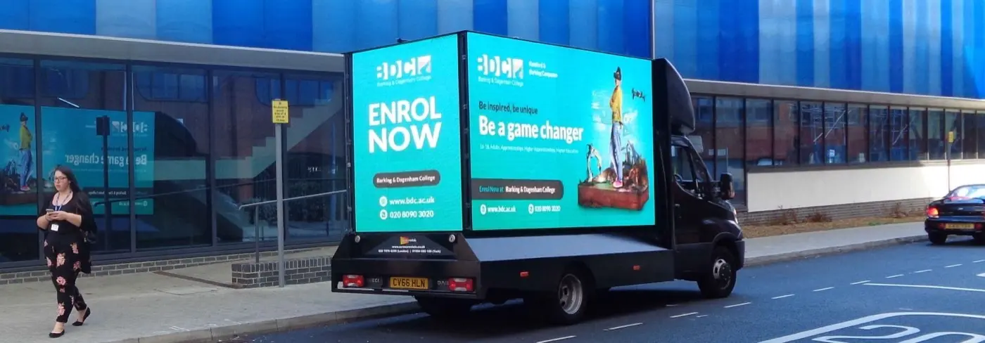 Branded guerrilla advertising van on a city street