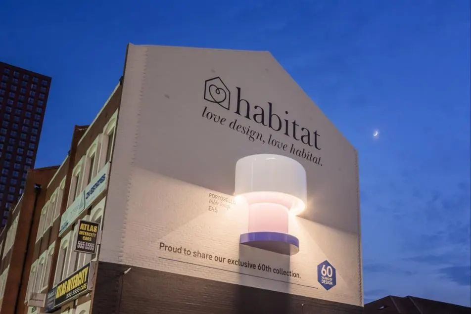 Habitat 3D billboard campaign on a London building at dusk