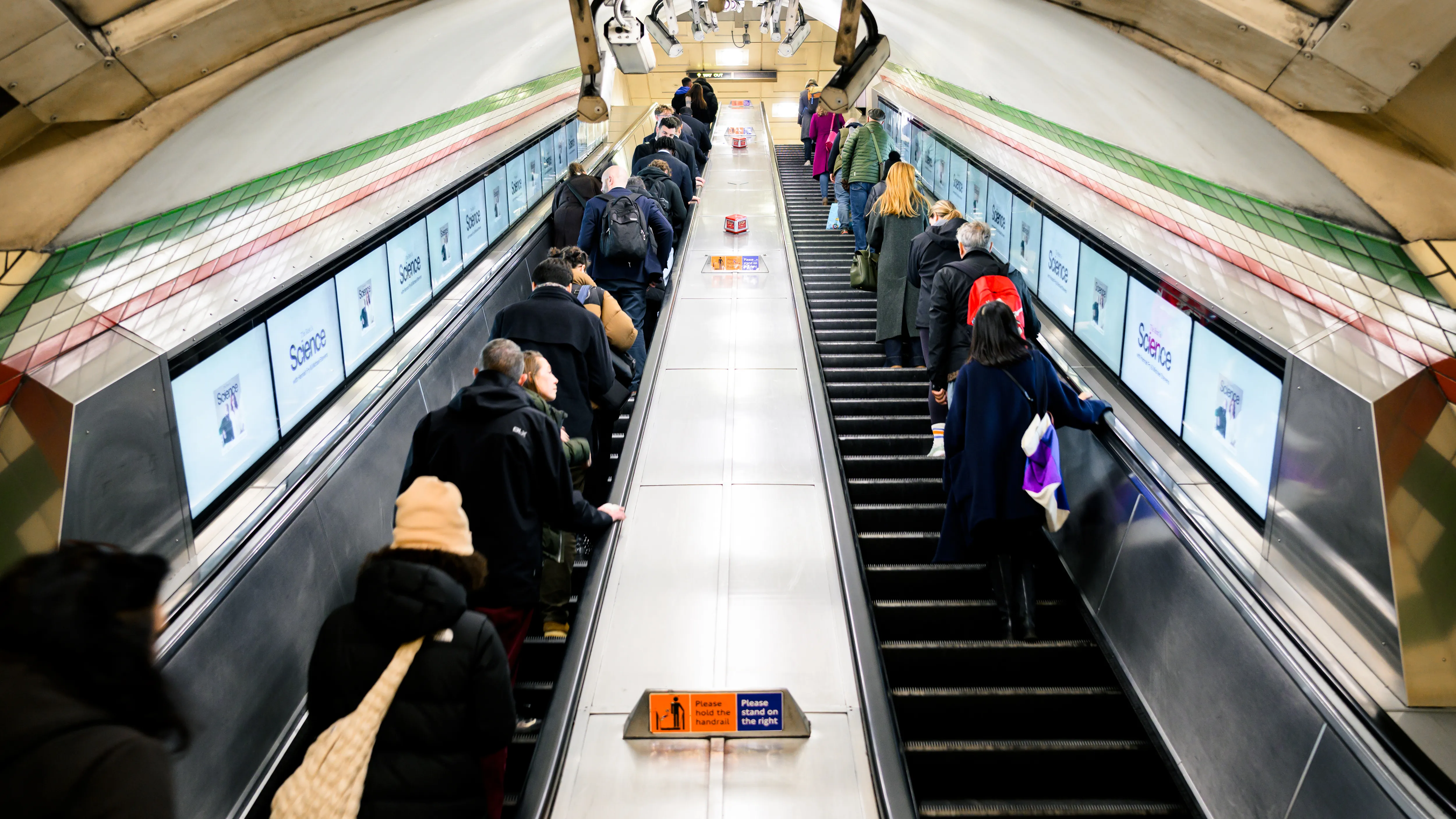 The Rest Is Science digital ribbon advertising on the London Underground